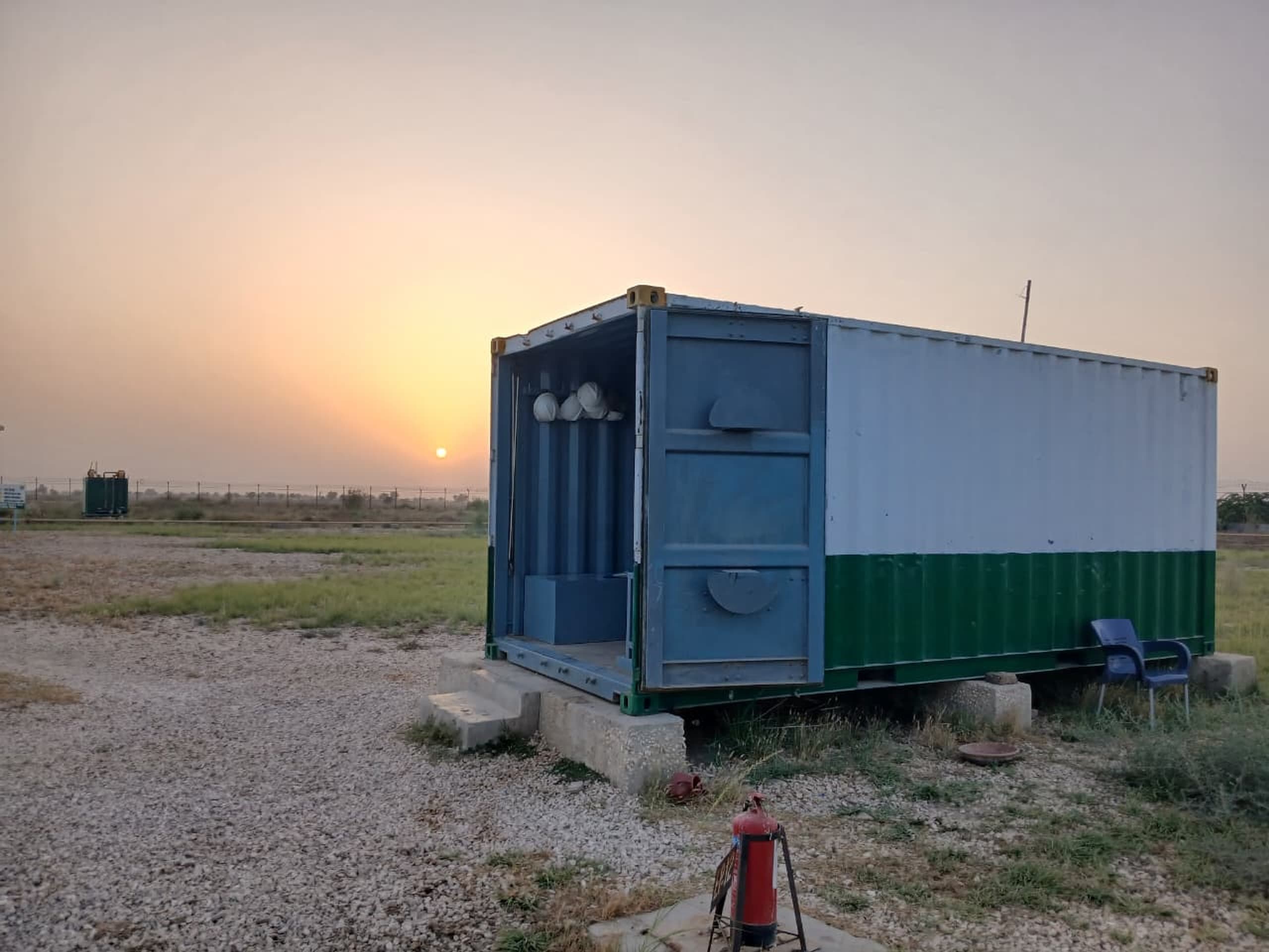 Field PPE and control cabin container at a well testing location